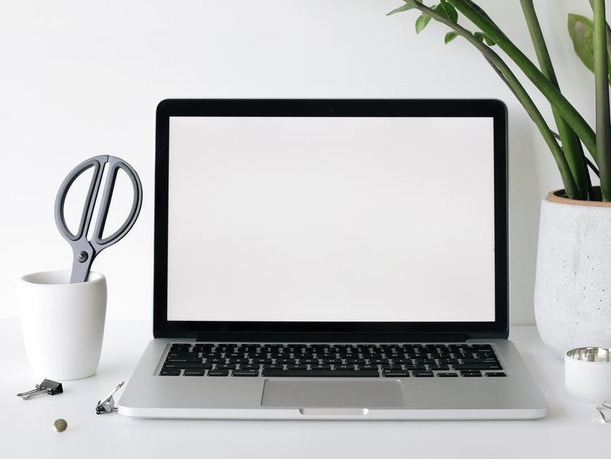 Photo of blank computer on a clean desk by Ann Nekr on Pexels.com